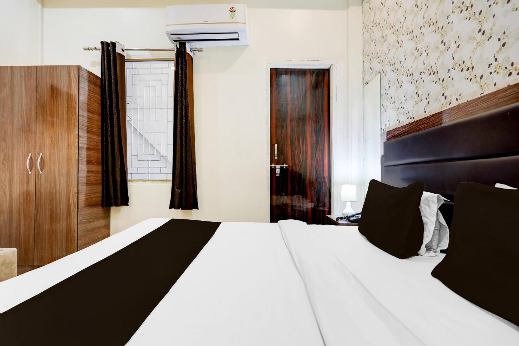 Super Hotel O Sankat Mochan Gandhi Nagar Kakarmatha Exterior foto